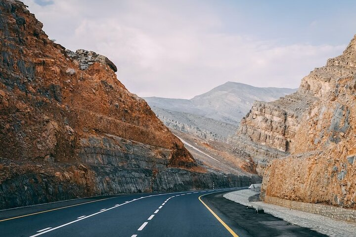 Experience the striking contrast of rugged mountains and smooth roads on this immersive tour exploring the diverse beauty and rich history of the UAE's six emirates.